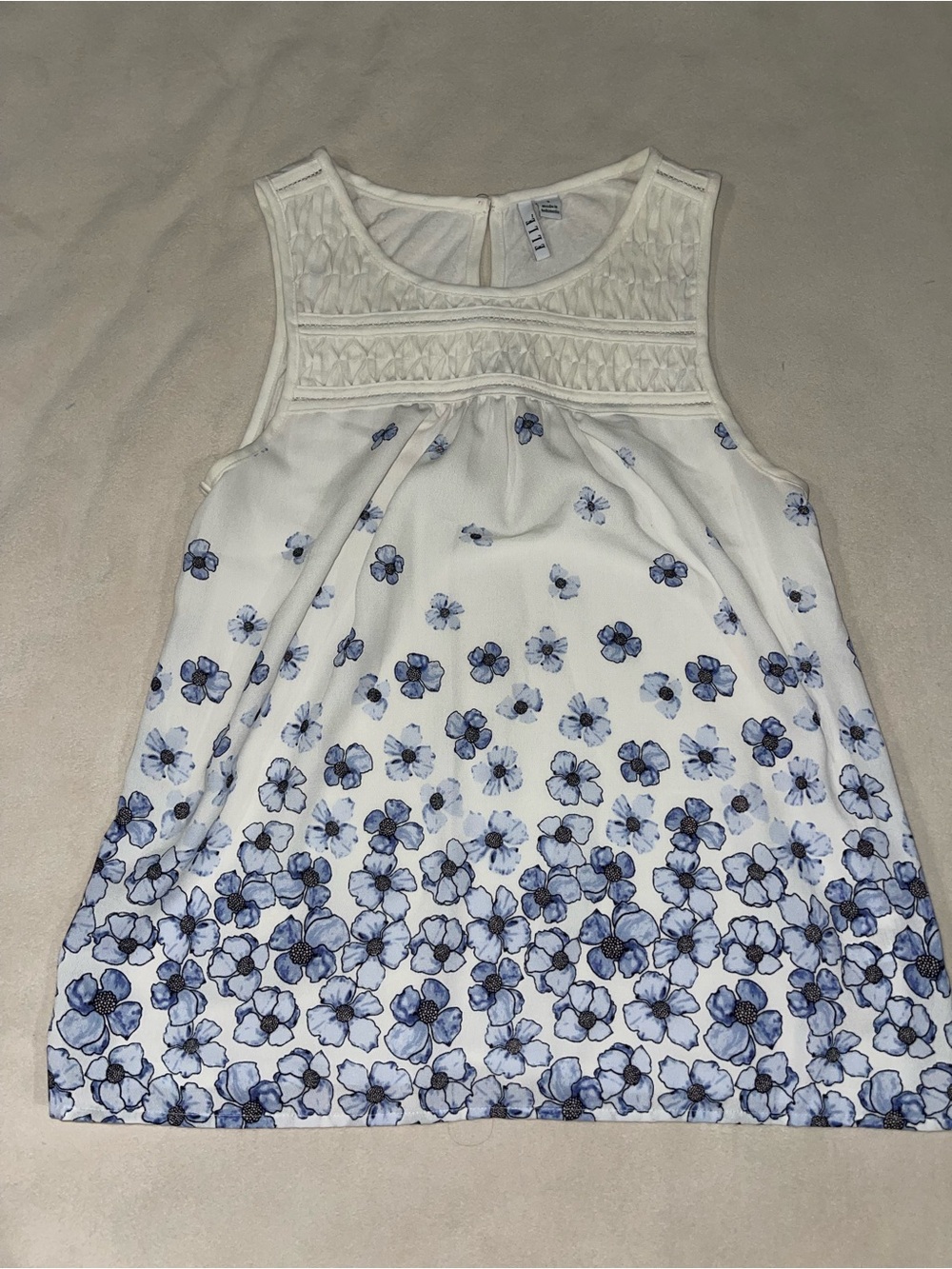 Elle‎ White Sleeveless Top with Blue Floral Hem